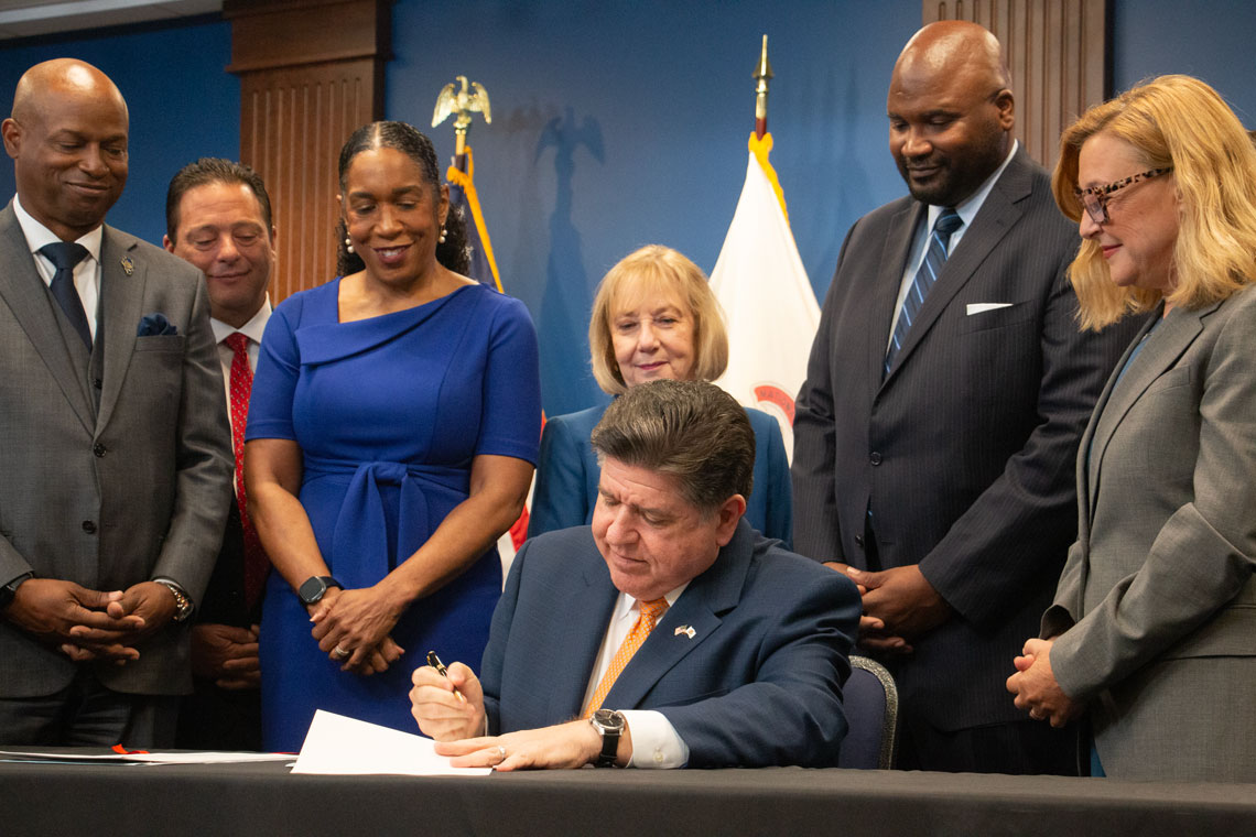 Pritzker signs nearly $56B budget with new business taxes as he