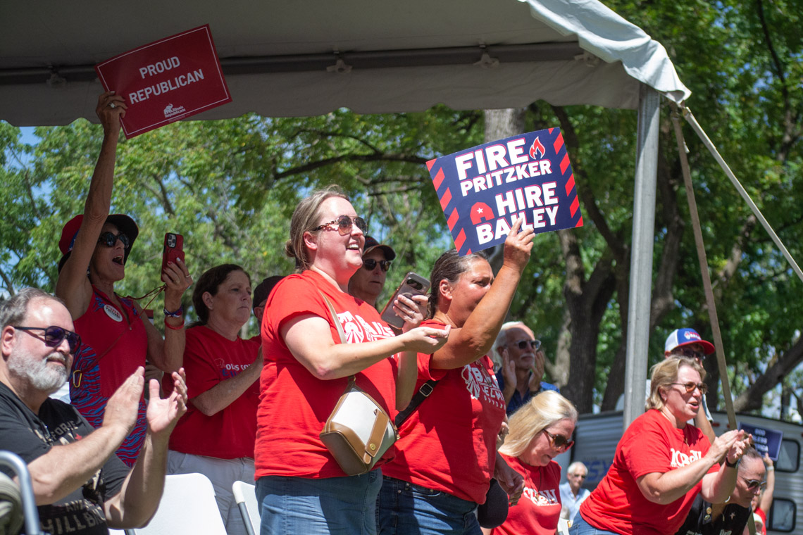 Fairgoers celebrate the Republican ticket